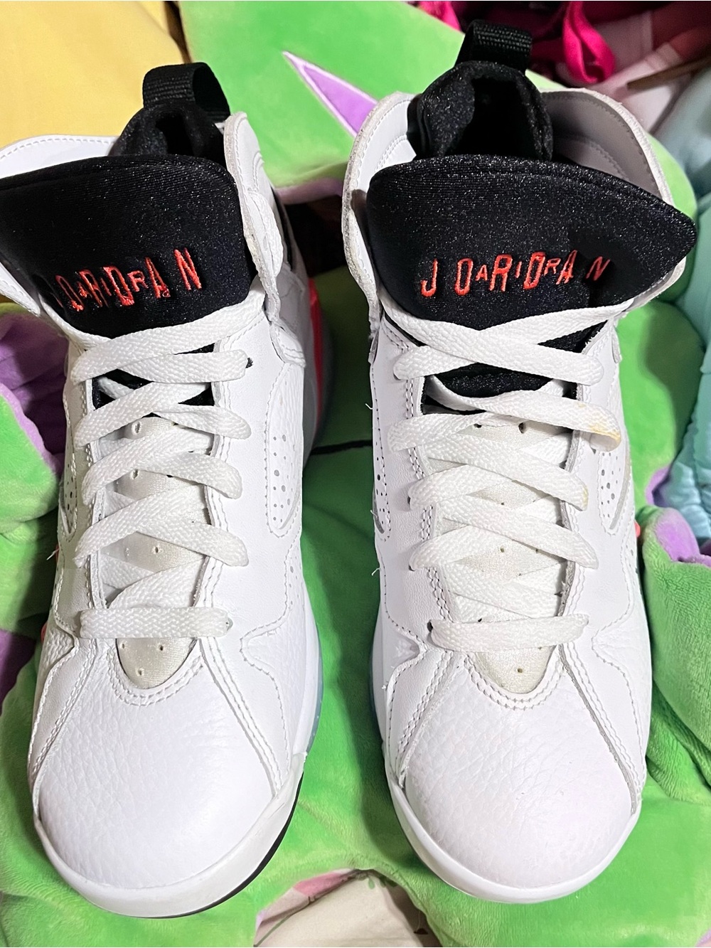 Jordan’s Kids' White and Black High-Top Sneakers
